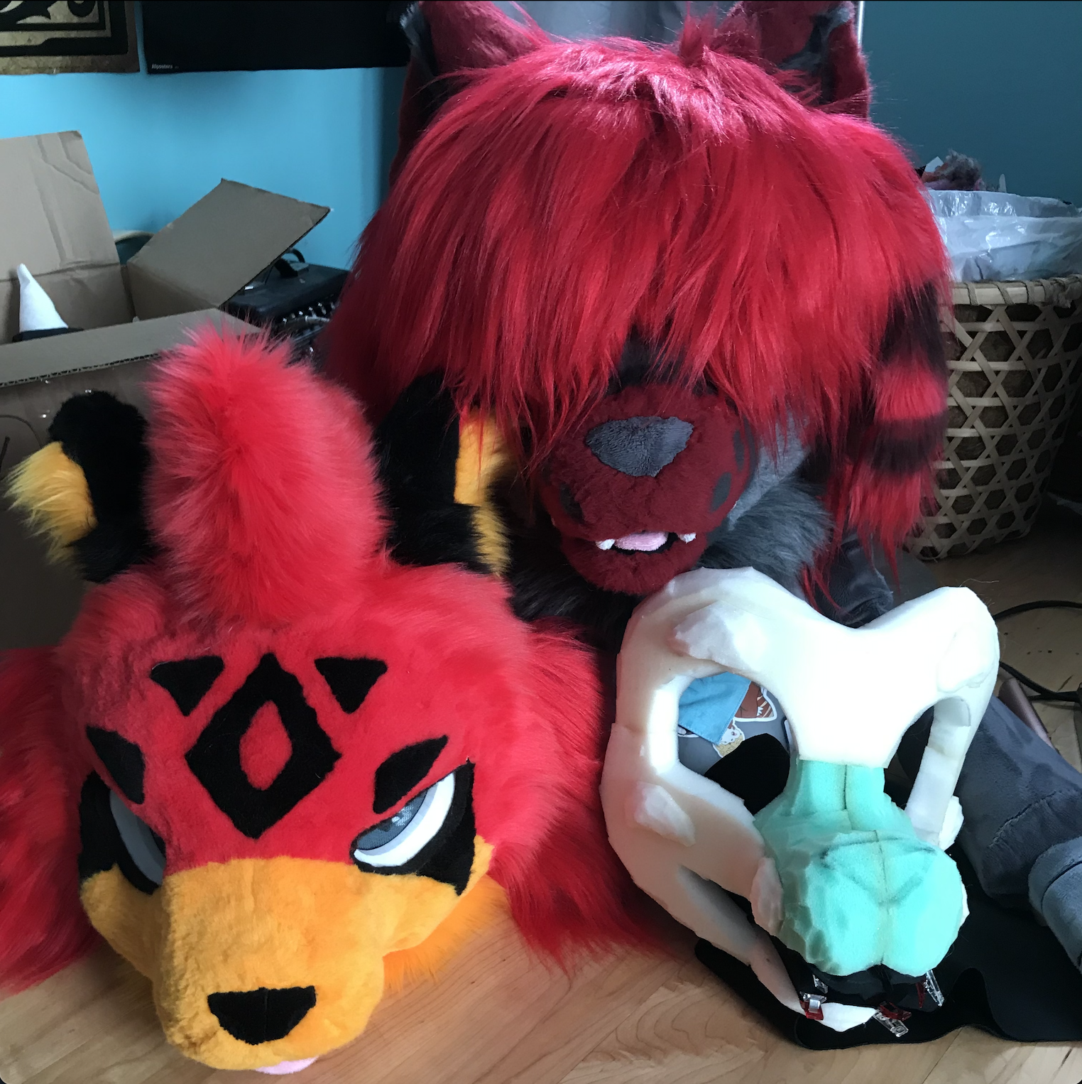Three of my suits (one WIP) Three fursuit heads
